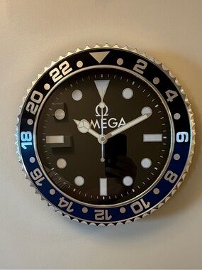 Omega Black and Blue Branded Wall Clock